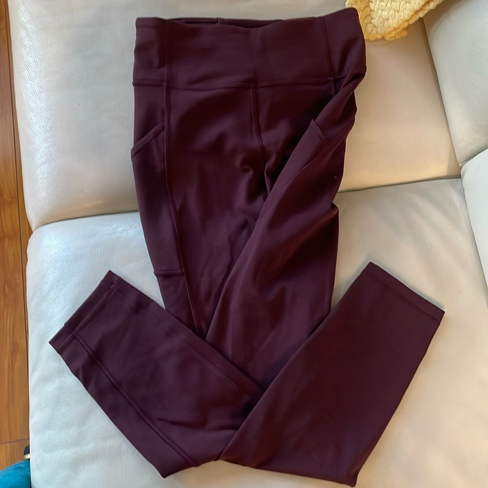 Lululemon wine color leggings size 4 with side pockets